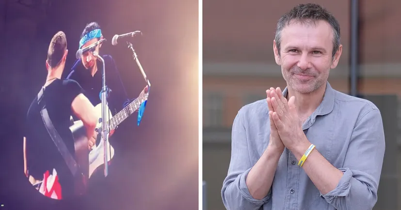 Coldplay у Варшаві заспівав «Обійми» з вуличним музикантом з України